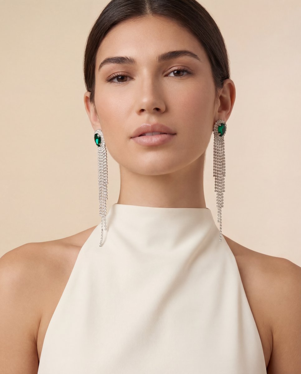 AI product photo — emerald crystal fringe earrings on model in halterneck